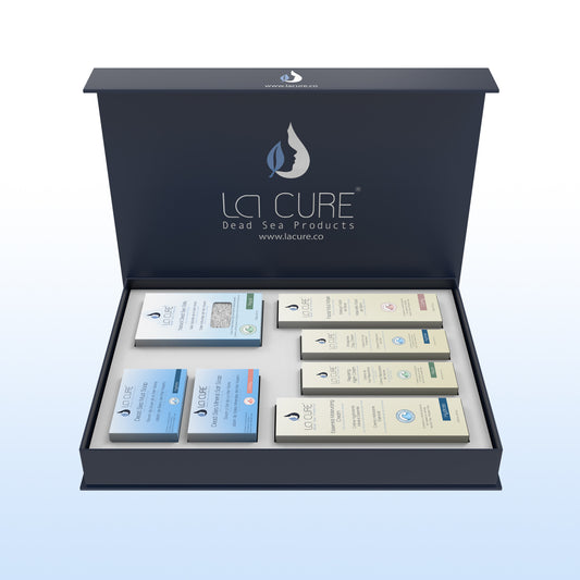 La Cure product set with various items in a box on a light blue background