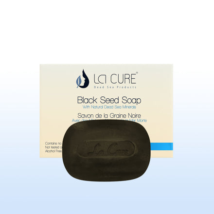 Black seed soap with LCI Cure packaging on a light blue background